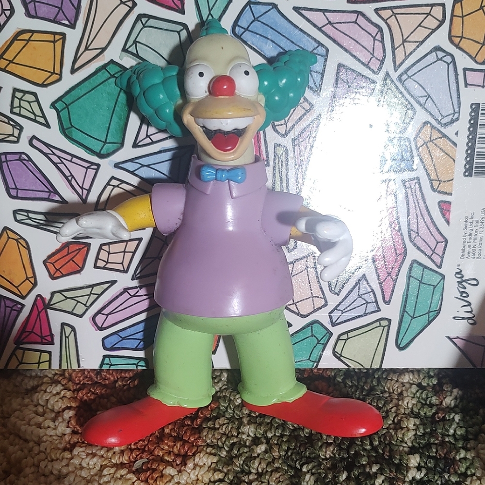 Whimsical Clown Action Figure with Red Shoes